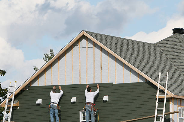 Professional Storm Damage Siding Repair technician working in Liverpool, PA